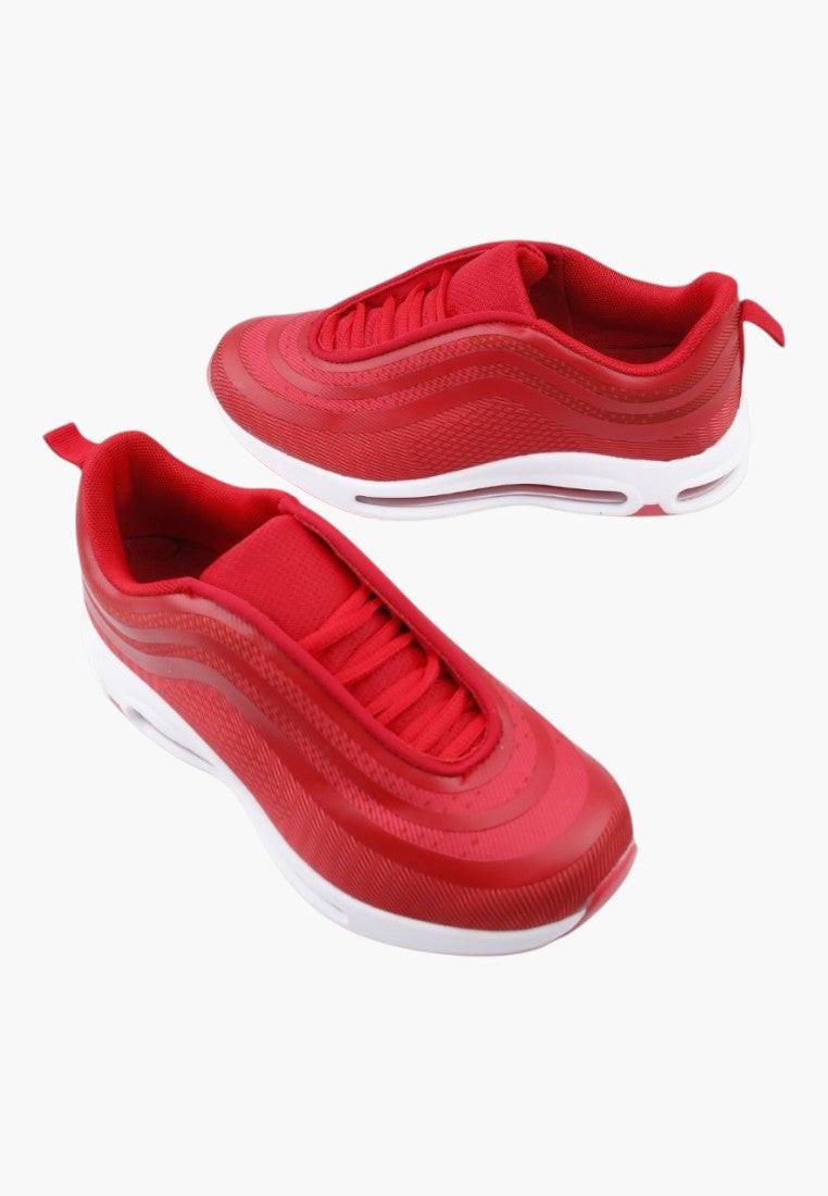 Czerwone buty sportowe z sznurowanym zapięciem, zbliżenie na podeszwę