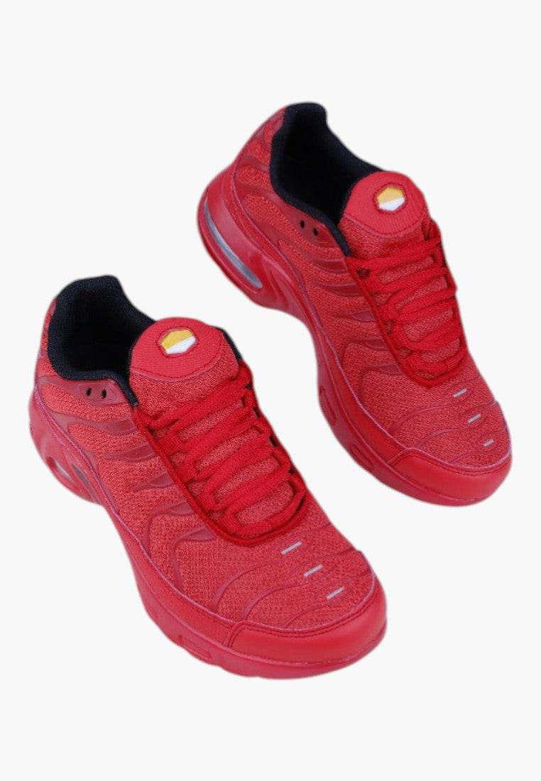 Czerwone damskie buty sportowe widok z przodu na białym tle