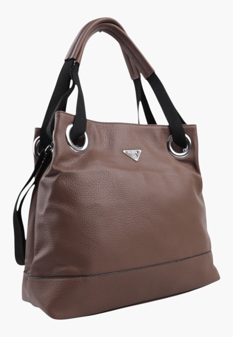 Torebka shopper w brązowej skórze ekologicznej, widok z boku.