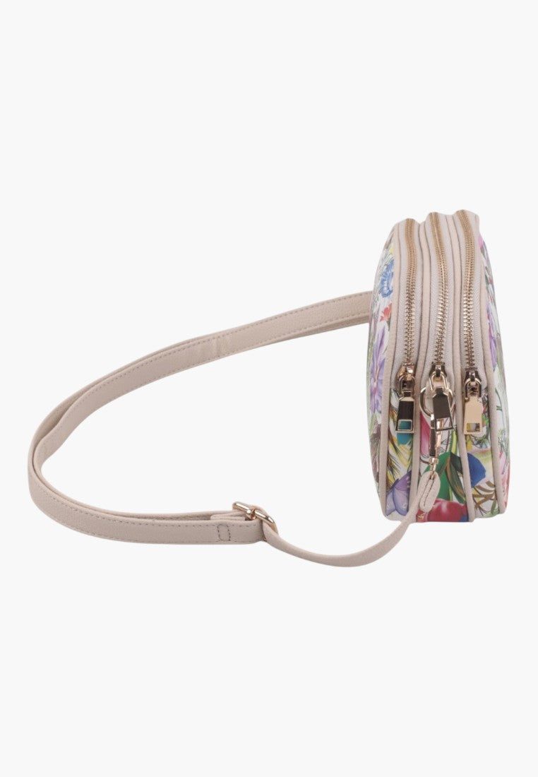 Bok torebki crossbody z kwiatowym wzorem, z trzema komorami.