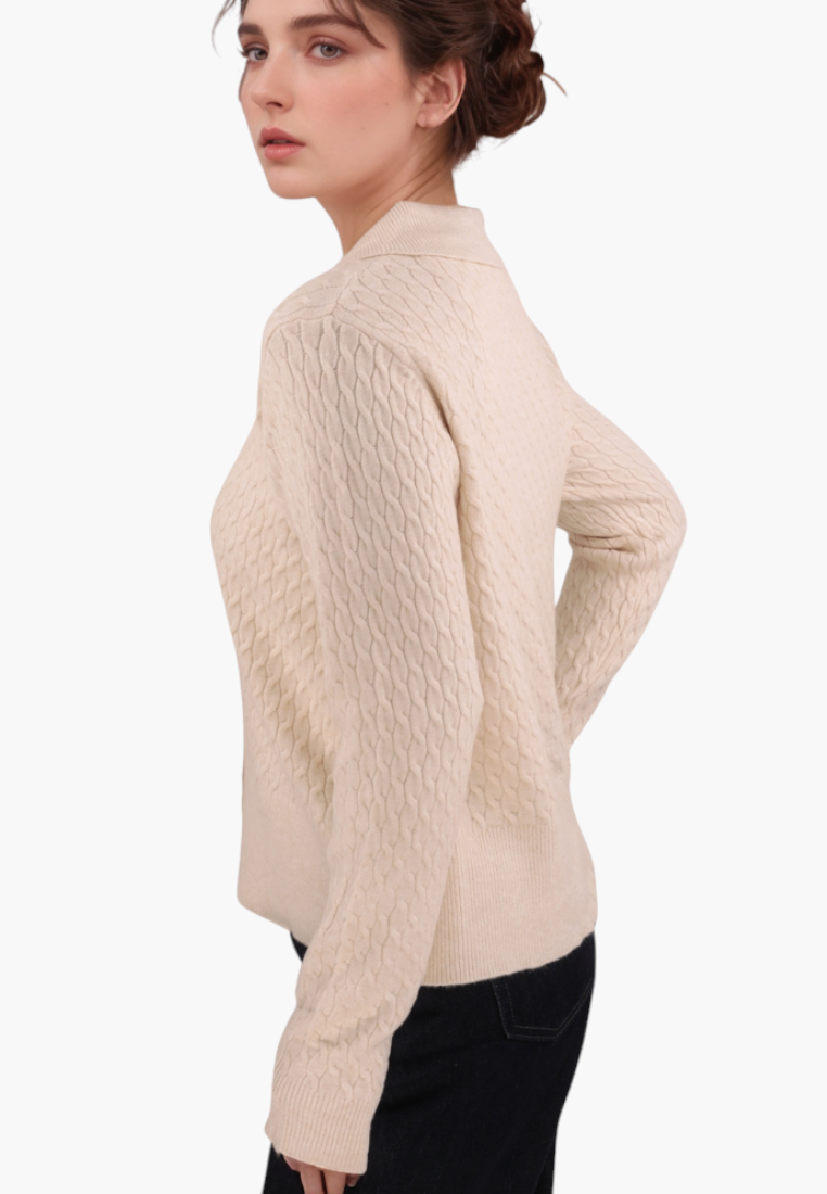 Falio beige cable knit button-up cardigan with long sleeves worn by a woman against a plain white background