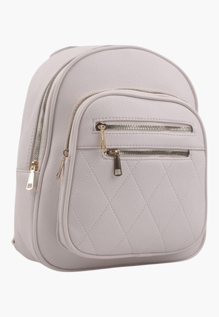 Falio beige urban backpack in eco-leather with quilted front pocket, gold zippers, and multiple compartments.