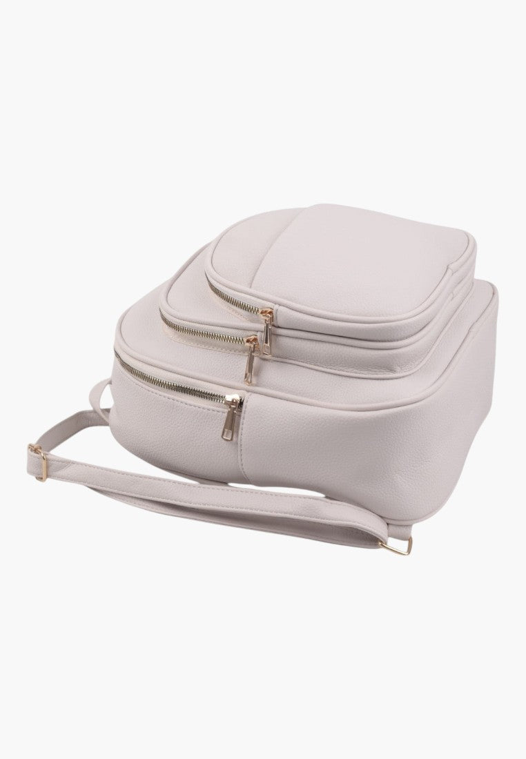 Falio beige urban women's backpack made of eco-leather with multiple zippered compartments and adjustable straps