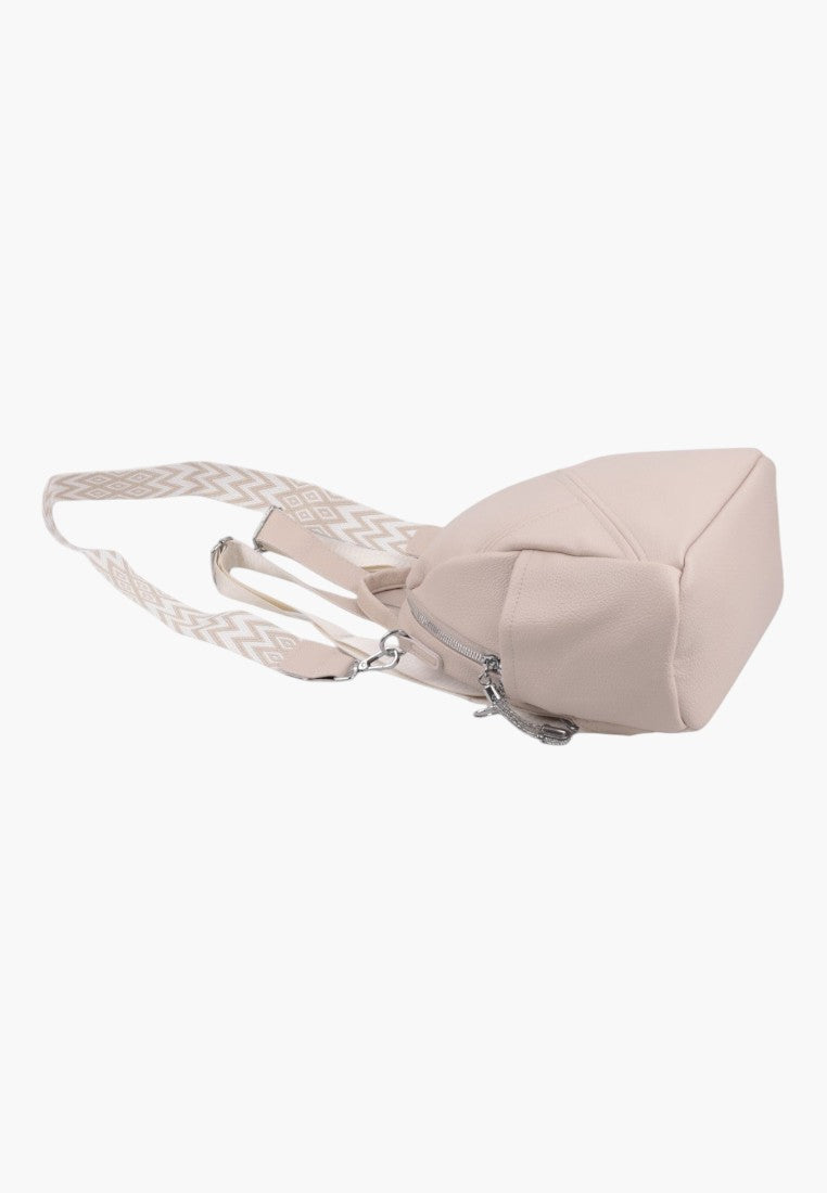Falio beige faux leather small urban backpack with patterned straps, side view