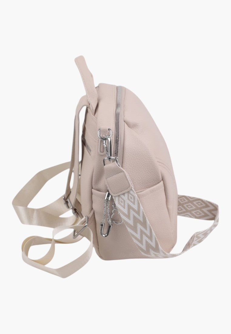 Falio beige faux leather urban backpack with patterned strap and silver hardware, side view
