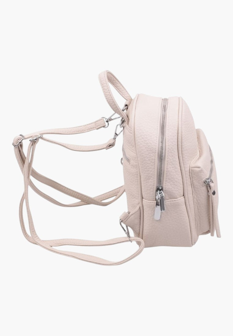 Falio small beige faux leather city backpack with silver zippers and adjustable straps, side view