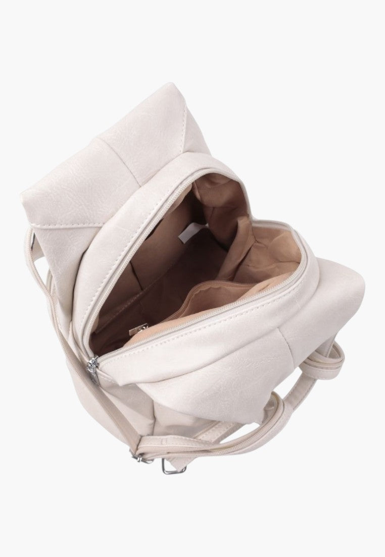 Falio beige faux leather urban backpack with a spacious main compartment and zipper closure, top-down view