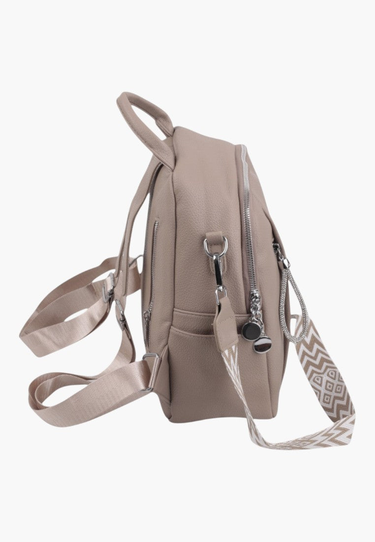 Falio beige faux leather urban backpack with side view, patterned strap, and silver zipper details.