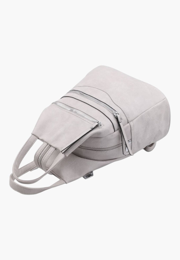 Falio beige faux leather urban backpack with multiple zippered compartments and top carry handle