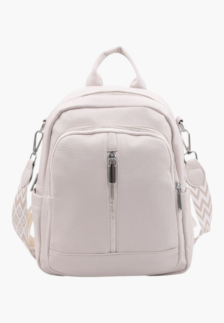 Falio beige faux leather urban backpack with a front zipper pocket and patterned straps for everyday use.