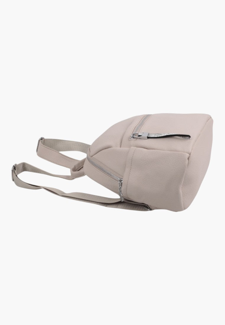 Falio urban women's backpack in beige faux leather with a compact design, multiple zippers, and adjustable straps.