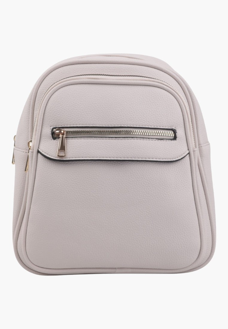 Falio beige faux leather urban backpack with a front zippered pocket and gold hardware for daily use.