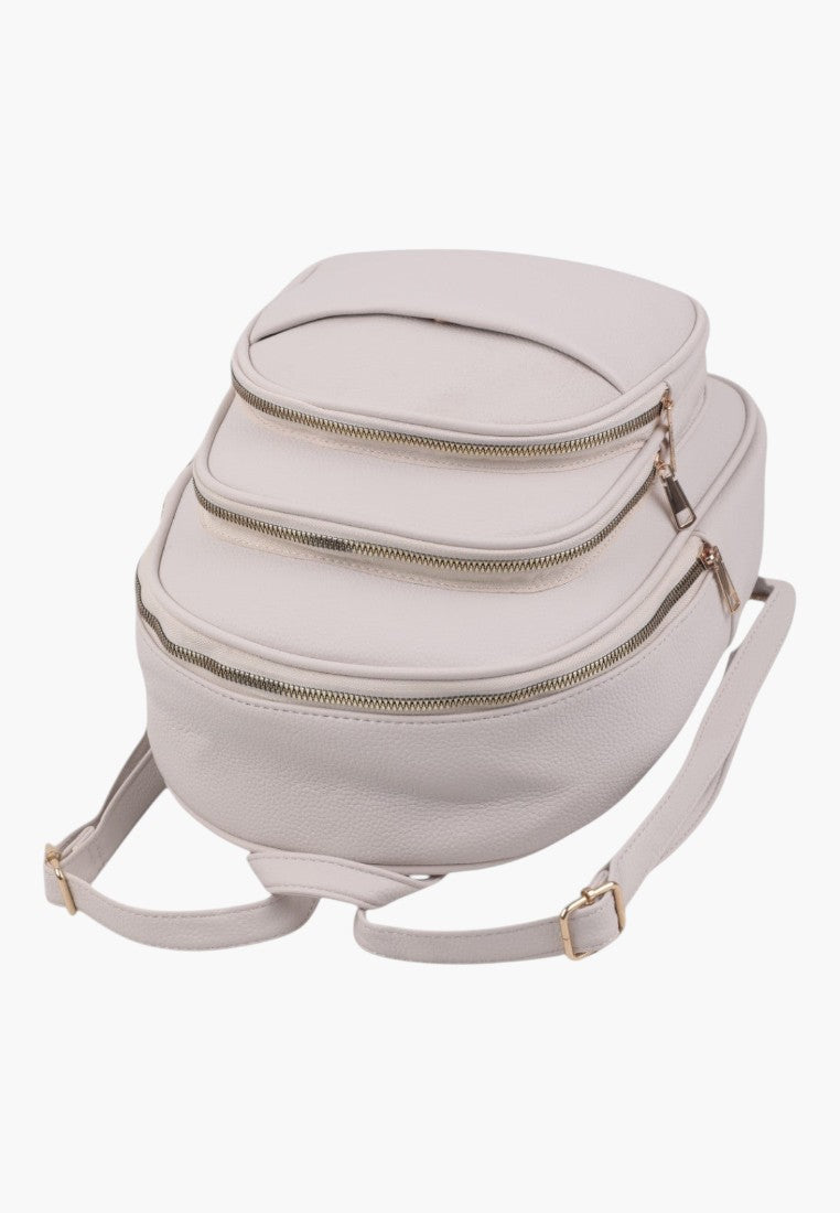 Falio beige faux leather urban backpack with multiple zippered compartments and adjustable straps