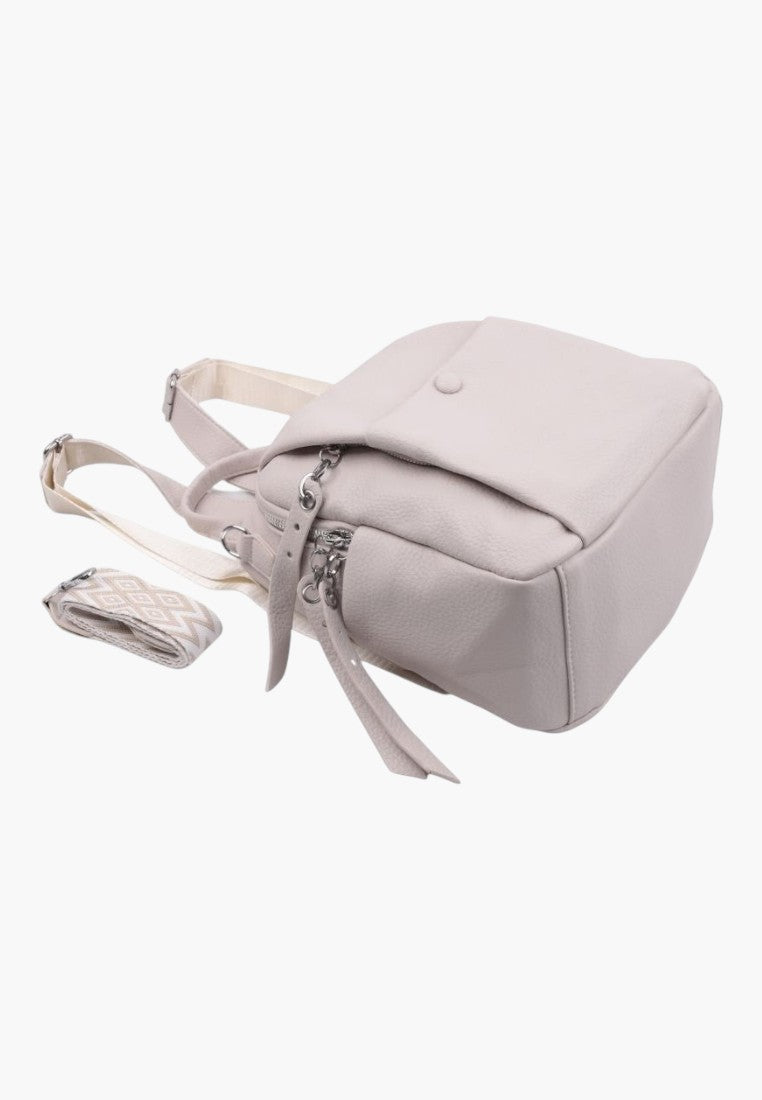 Falio beige faux leather urban backpack with a small compact design, multiple pockets, and patterned shoulder straps.