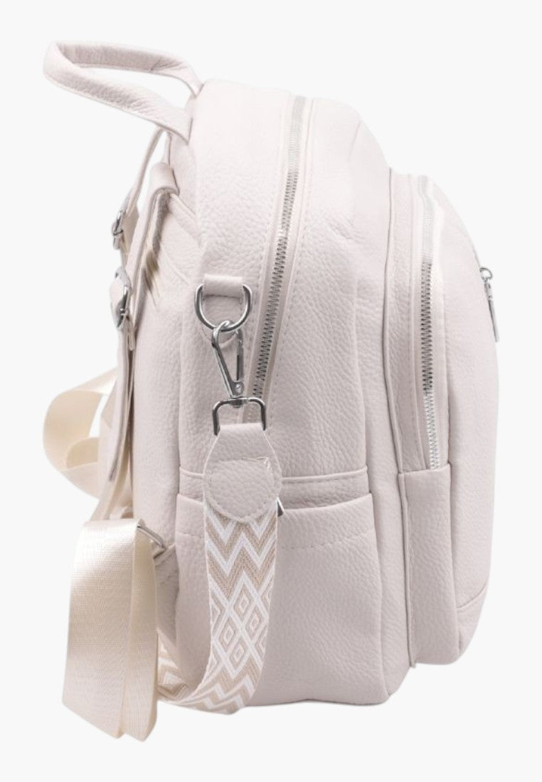 Falio beige faux leather urban backpack with multiple zippered pockets and a decorative patterned strap