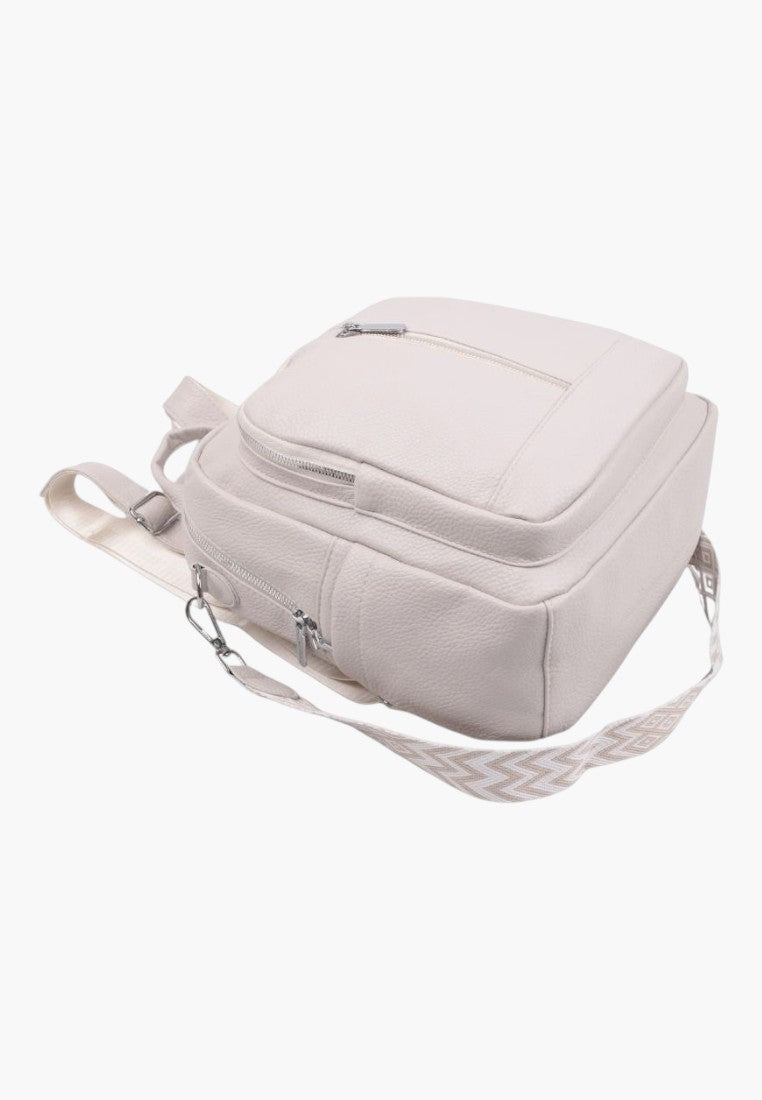 Falio beige faux leather urban backpack with a patterned strap and multiple zippered compartments