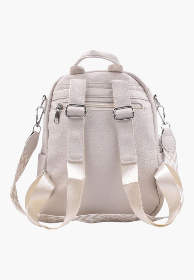 Falio beige faux leather urban backpack with adjustable patterned straps and multiple zippered pockets, back view.
