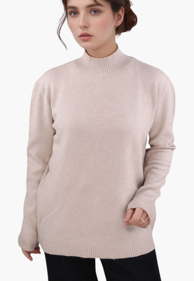 Model wearing a Falio beige plus size long-sleeve sweater with a ribbed mock neck, made from a soft viscose blend.