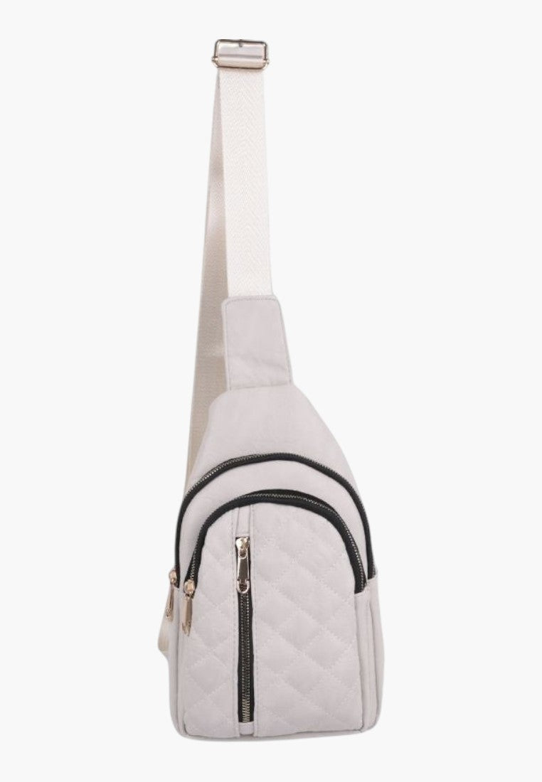 Falio beige quilted faux leather urban sling backpack with black zipper details and adjustable shoulder strap
