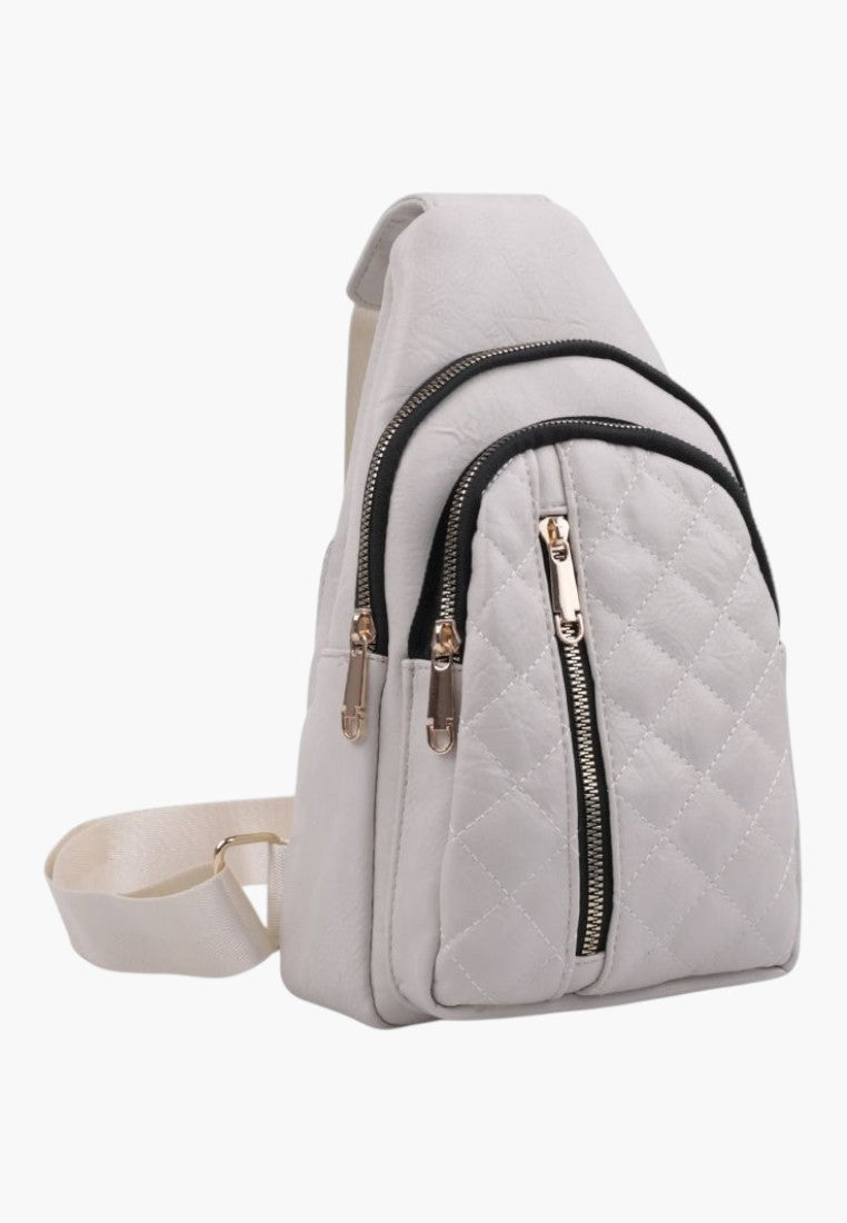 Falio beige quilted faux leather urban sling backpack with multiple zippered pockets and adjustable strap