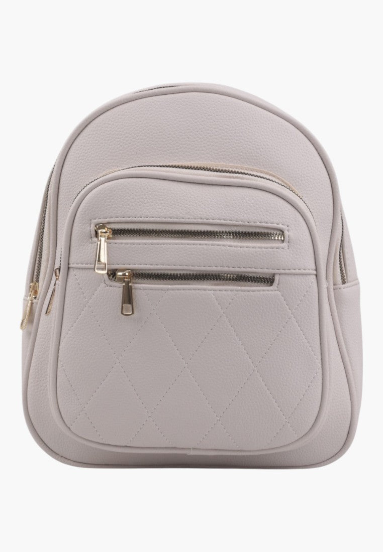 Falio beige urban backpack made of eco-leather with a quilted front pocket and gold zipper details.