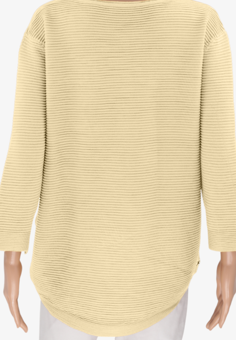 Falio women's beige ribbed knit sweater with long sleeves and a rounded hem, displayed on a mannequin