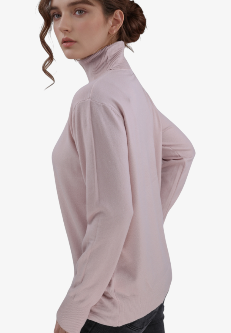 Falio beige viscose mock neck sweater worn by a woman, featuring long sleeves and a classic fitted design.