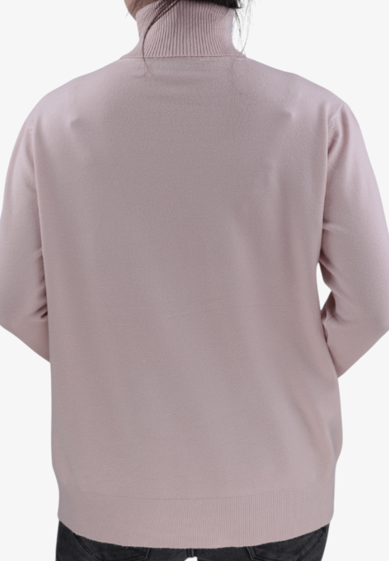 Back view of a Falio beige viscose blend sweater with a mock neck, worn by a woman against a white background.