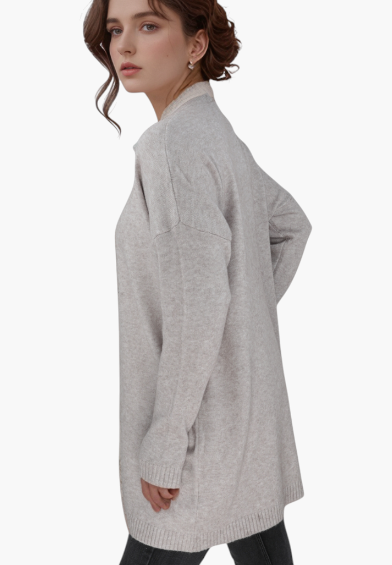 Falio plus size beige wool and cashmere blend sweater with long sleeves and round neckline worn by a model