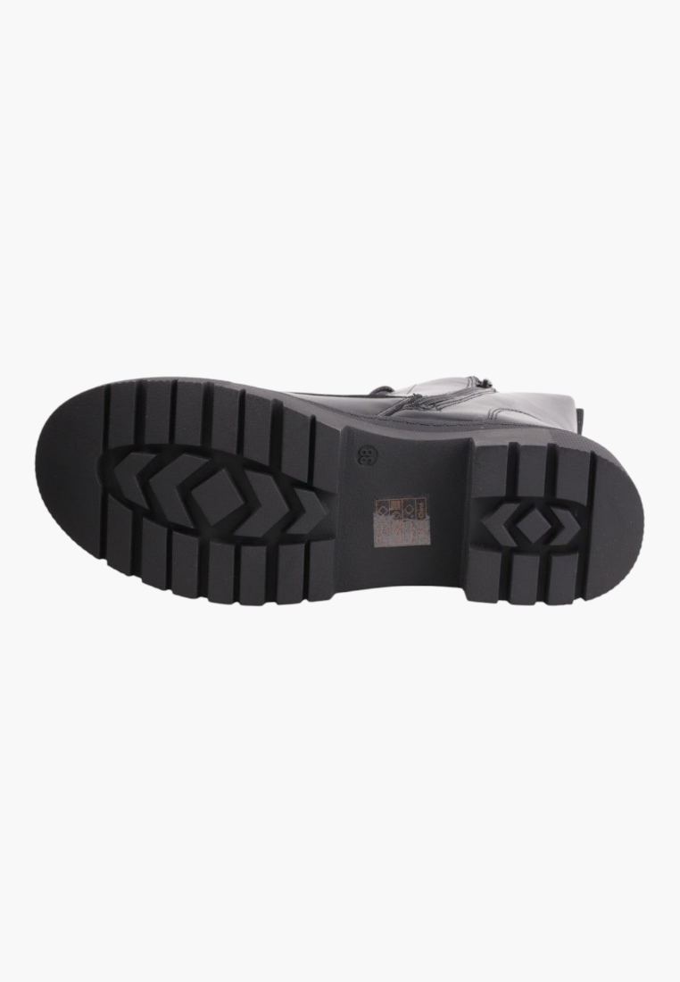 Falio black ankle boot with a durable lugged rubber sole for superior traction and grip