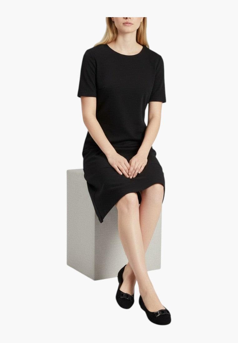 Falio black eco-leather ballet flats with a decorative chain detail on the toe and a flat sole.
