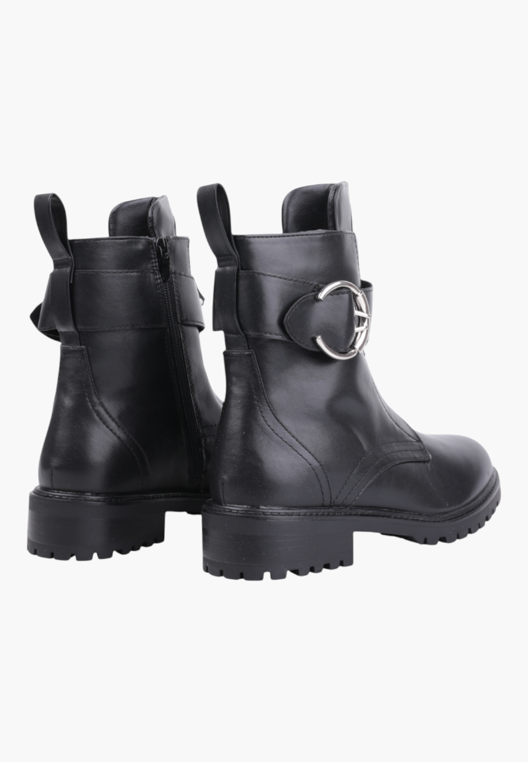 Falio black ankle boots featuring a side buckle detail and a sturdy lug sole for autumn and winter wear.