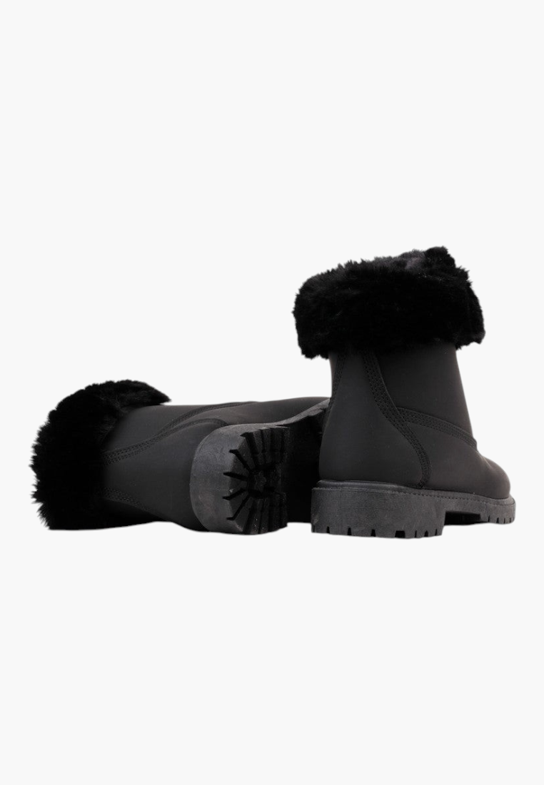 Falio black synthetic nubuck ankle boots with faux fur lining and trim, featuring a flat lug sole and lace-up design.