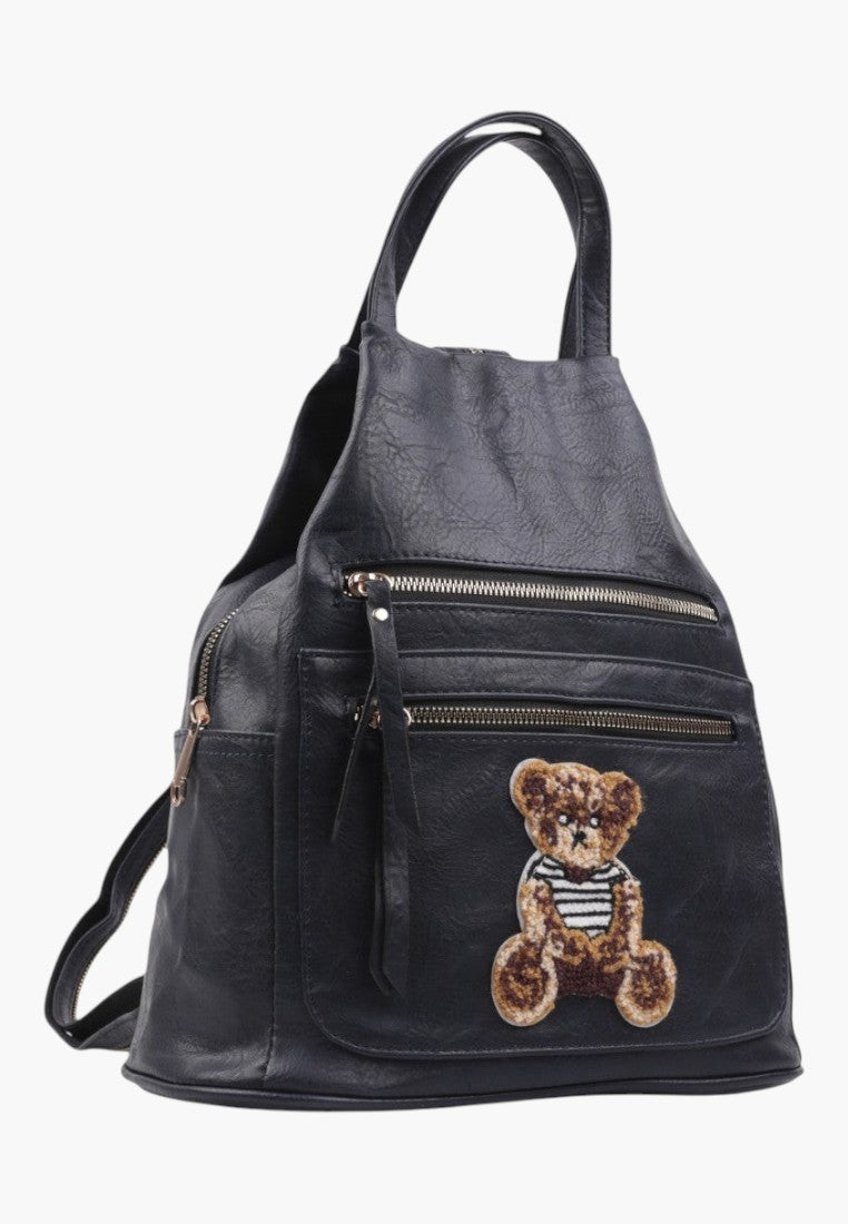 Falio black faux leather urban backpack with a cute teddy bear patch and multiple zippered pockets