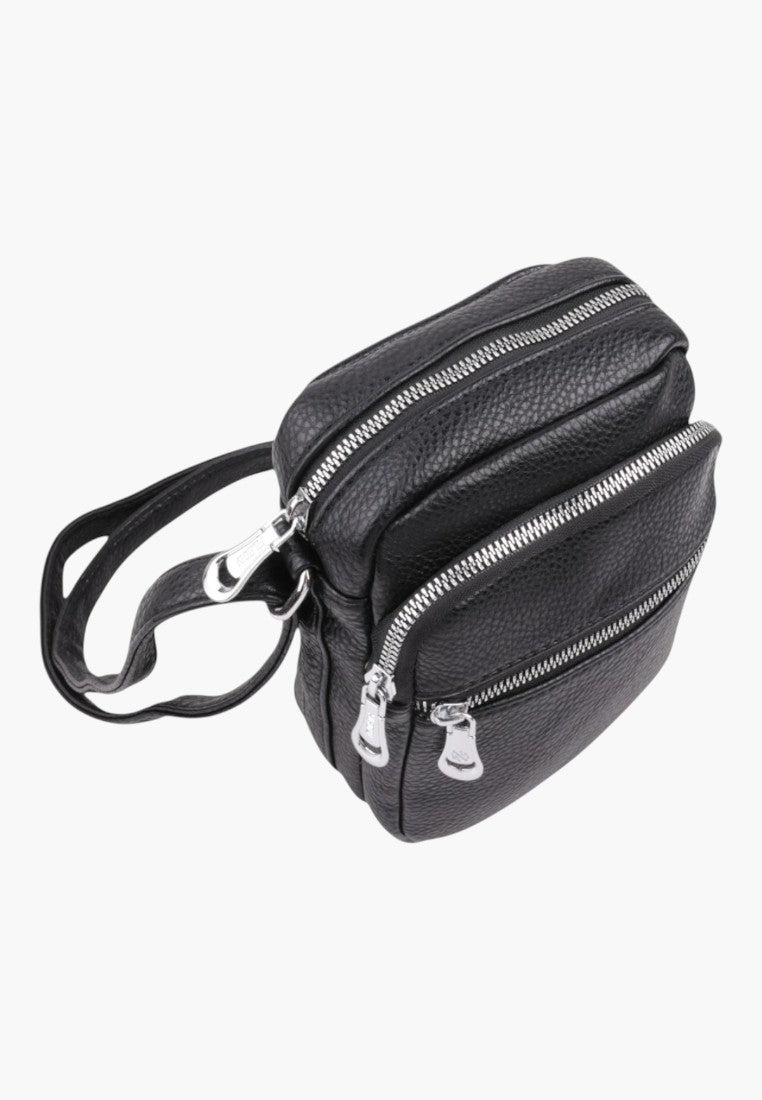 Falio small black faux leather crossbody bag with multiple zippered compartments and an adjustable shoulder strap.