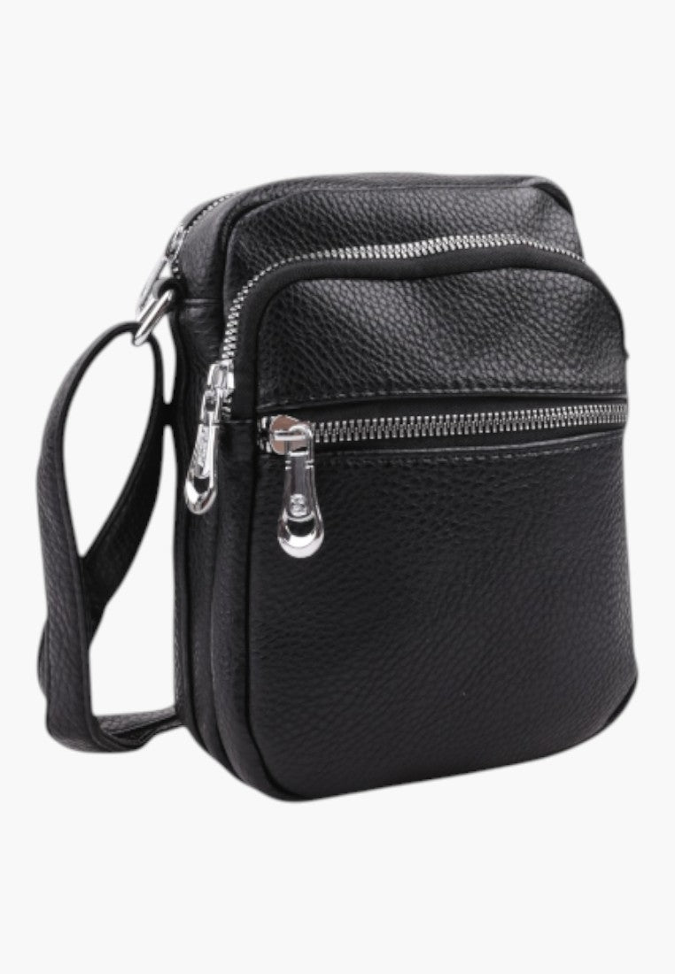 Falio small black faux leather crossbody bag with silver zippers and an adjustable shoulder strap
