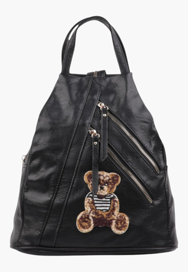 Falio black faux leather urban backpack with a cute teddy bear patch and multiple diagonal zipper pockets
