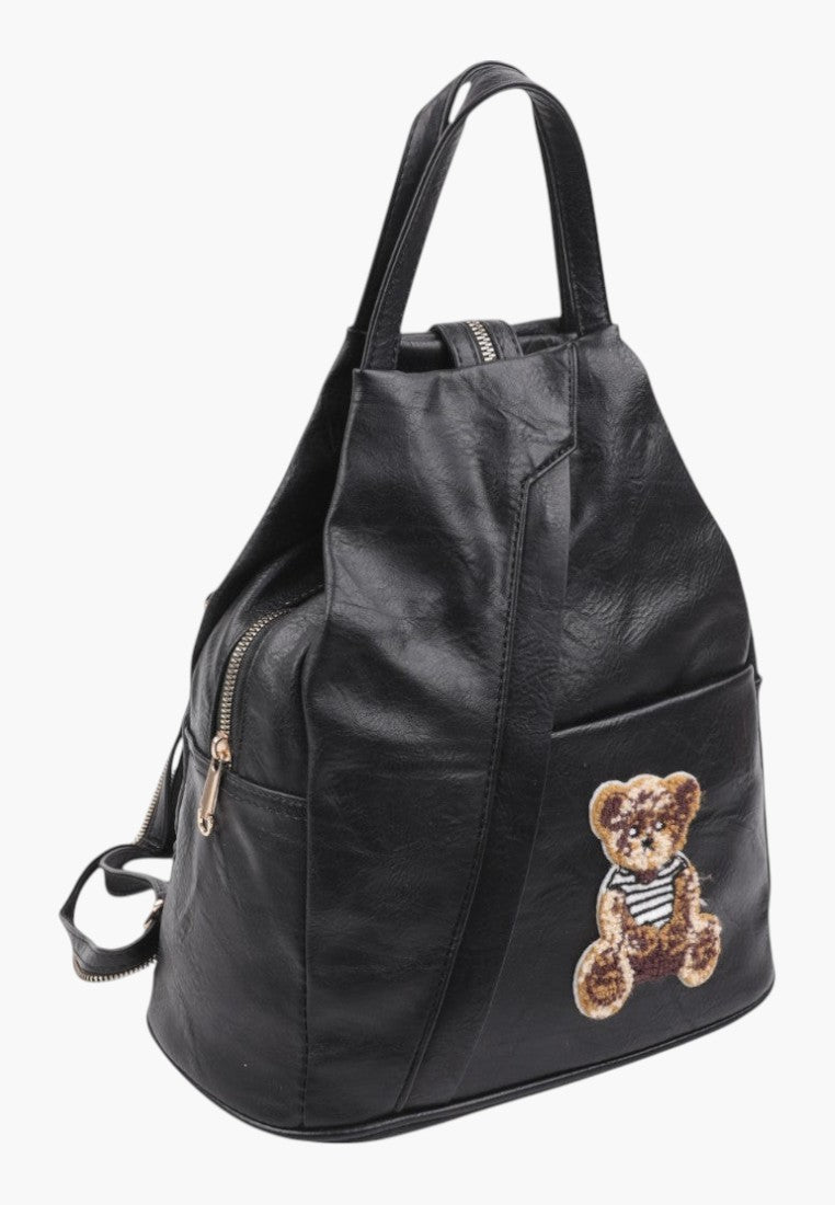 Falio small black faux leather urban backpack with a cute teddy bear patch and secure zipper closure