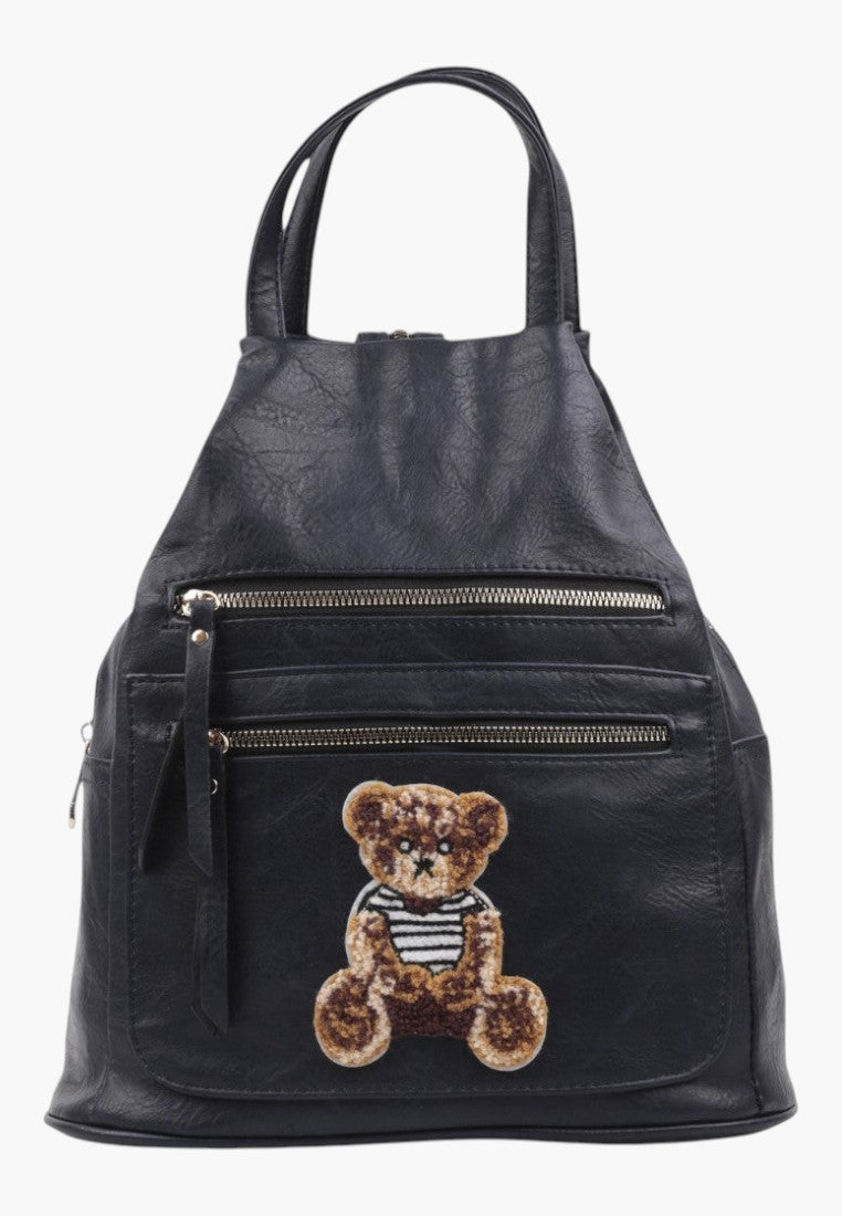 Falio black faux leather urban backpack with a cute teddy bear patch and multiple zippered pockets