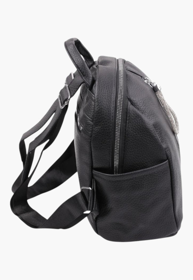 Falio black urban women's backpack made of faux leather with side pockets and zipper closure, side view