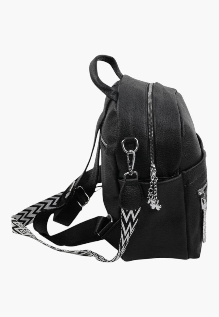 Falio black faux leather urban backpack with patterned straps and silver zipper details, side view