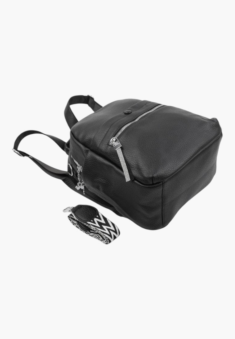 Falio black faux leather urban backpack with a patterned detachable strap and multiple zippered compartments.