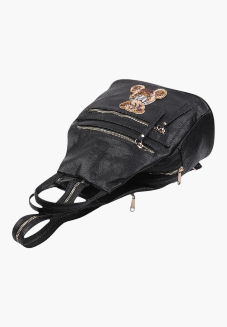 Falio black faux leather urban backpack with a cute bear patch and multiple zippered pockets for daily use
