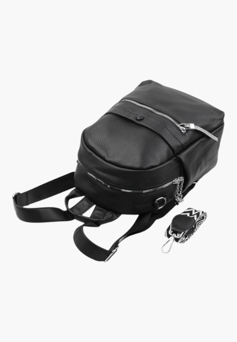 Falio black faux leather urban backpack with multiple zippered pockets and a detachable patterned shoulder strap