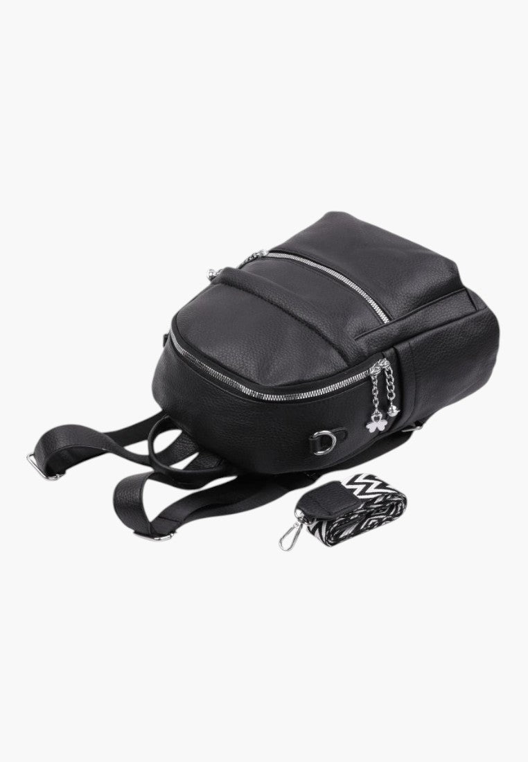Falio black faux leather urban backpack with silver zippers and a detachable patterned strap for women