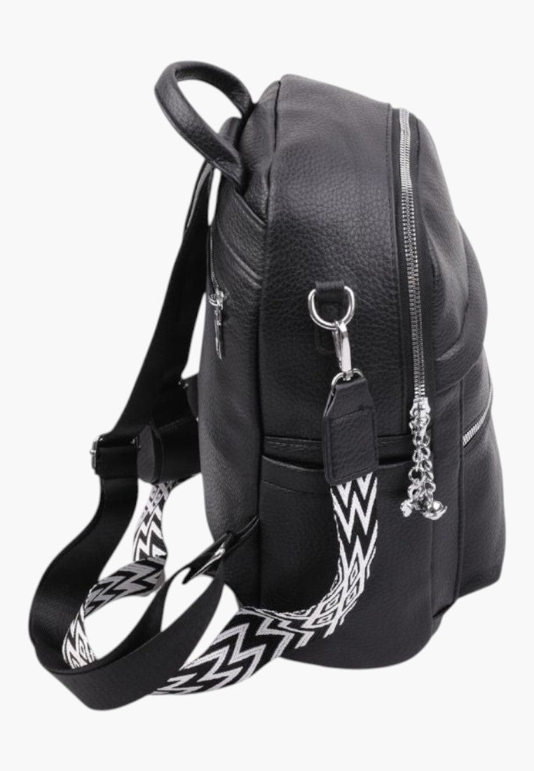 Falio black faux leather urban backpack with A4 capacity, silver zippers, and patterned adjustable shoulder straps.