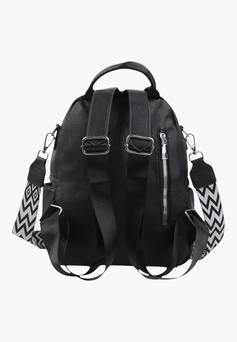 Falio black faux leather urban backpack with patterned straps and a rear zippered pocket