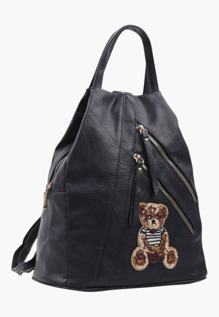 Falio black faux leather urban backpack with multiple zippered pockets and a cute teddy bear patch