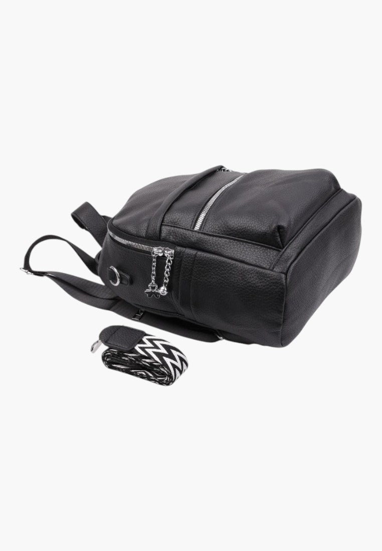 Falio black faux leather urban backpack with silver zippers and a detachable patterned shoulder strap