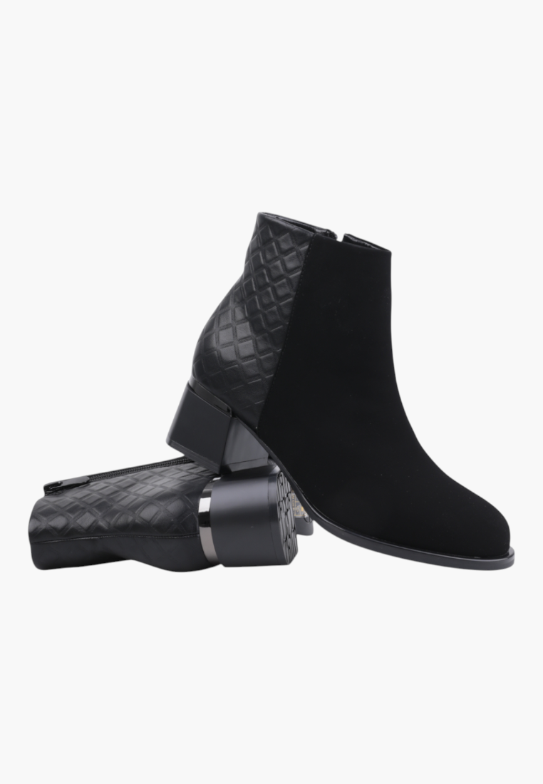 Falio black faux suede ankle boots with quilted heel detail, round toe, and side zipper closure.
